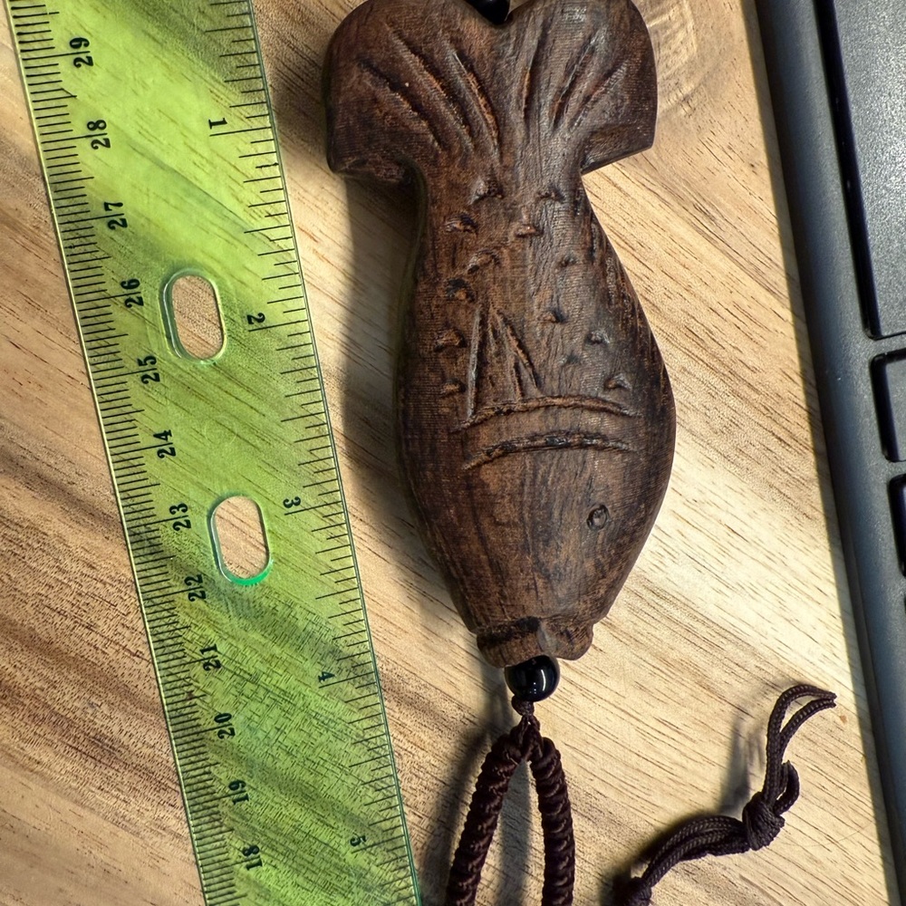 Rustic Brown Wooden Necklace with Intricate Carvings